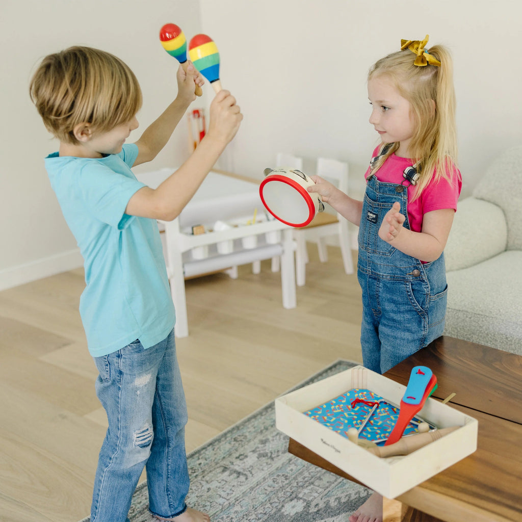 Melissa & Doug Band-in-a-Box ¡Aplaude! ¡Choca! ¡Toca! – Set de Instrumentos Musicales de 10 Piezas